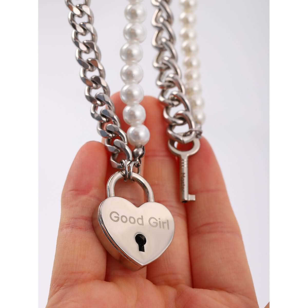 Heart Lock Key Pendant Necklaces, Meaning Anniversary Gift For Her For Him. His Lock and Her Key design symbolizing enduring love. Crafted with high-quality materials, perfect for any occasion. Wonder Skull Heart Lock Key Pendant Necklace, ideal anniversary gift for both him and her. Elevate your date night look with Wonder Skull sleepwear and lingerie.