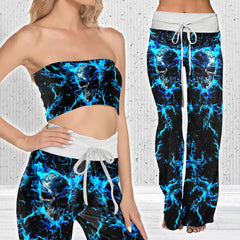 Image featuring a stylish set of women's tube top and high-waisted pants, perfect for summer outings and beachwear. The ensemble exudes a trendy and chic vibe, ideal for resort vacations, beach parties, and poolside lounging. The tube top offers a flattering silhouette, while the high-waisted pants provide comfort and style. This fashionable outfit set is a must-have for anyone looking to make a statement under the sun.