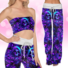 Image featuring a stylish set of women's tube top and high-waisted pants, perfect for summer outings and beachwear. The ensemble exudes a trendy and chic vibe, ideal for resort vacations, beach parties, and poolside lounging. The tube top offers a flattering silhouette, while the high-waisted pants provide comfort and style. This fashionable outfit set is a must-have for anyone looking to make a statement under the sun.