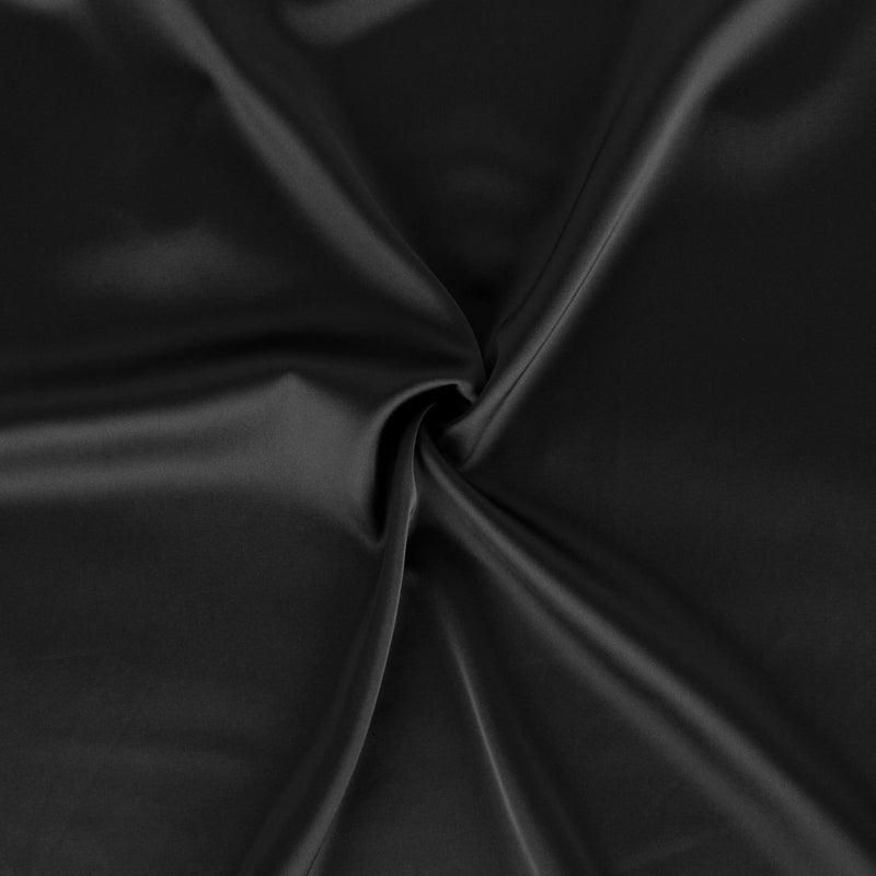 An lace nightgown with an open back design and adjustable straps. The delicate lace detailing and babydoll style provide a feminine and seductive look, while the soft and lightweight fabric ensures comfort and a flattering fit for every body type.