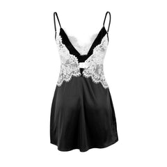 An lace nightgown with an open back design and adjustable straps. The delicate lace detailing and babydoll style provide a feminine and seductive look, while the soft and lightweight fabric ensures comfort and a flattering fit for every body type.