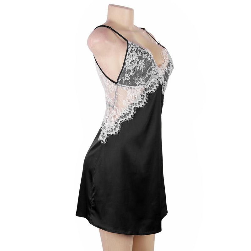 An lace nightgown with an open back design and adjustable straps. The delicate lace detailing and babydoll style provide a feminine and seductive look, while the soft and lightweight fabric ensures comfort and a flattering fit for every body type.
