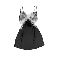 An lace nightgown with an open back design and adjustable straps. The delicate lace detailing and babydoll style provide a feminine and seductive look, while the soft and lightweight fabric ensures comfort and a flattering fit for every body type.