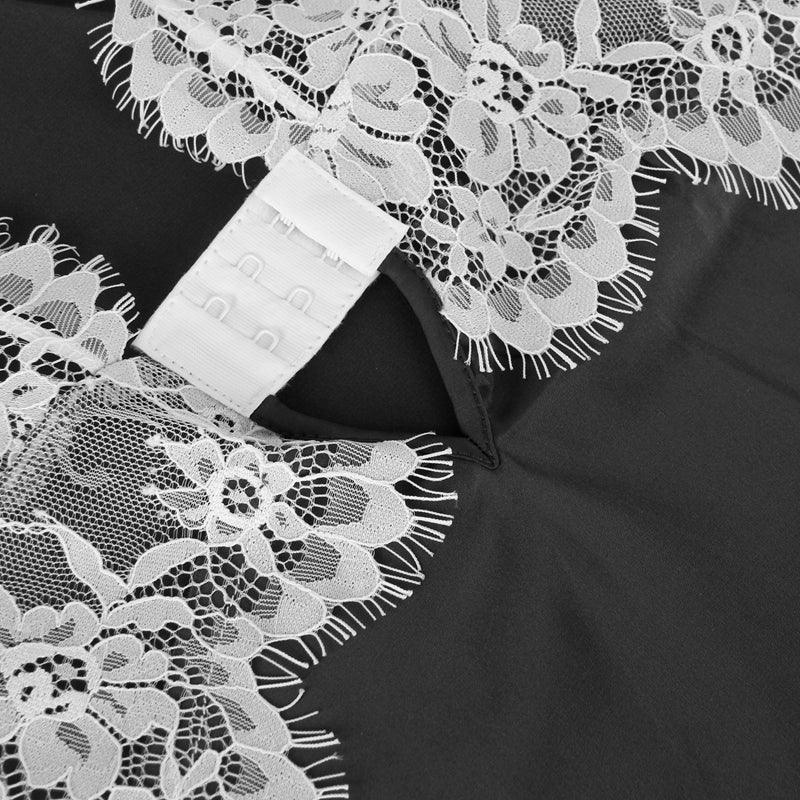 An lace nightgown with an open back design and adjustable straps. The delicate lace detailing and babydoll style provide a feminine and seductive look, while the soft and lightweight fabric ensures comfort and a flattering fit for every body type.