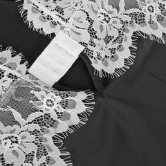 An lace nightgown with an open back design and adjustable straps. The delicate lace detailing and babydoll style provide a feminine and seductive look, while the soft and lightweight fabric ensures comfort and a flattering fit for every body type.