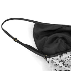 An lace nightgown with an open back design and adjustable straps. The delicate lace detailing and babydoll style provide a feminine and seductive look, while the soft and lightweight fabric ensures comfort and a flattering fit for every body type.