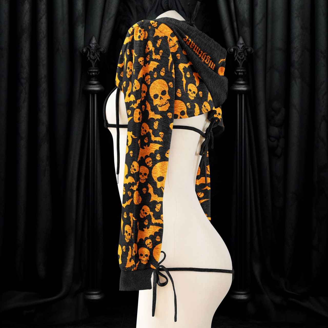 An alluring and seductive lingerie set with a gothic style, featuring intricate details and a unique print that makes it perfect for Halloween or any daring occasion. The set includes a top and bottom, both designed to fit perfectly and enhance the wearer's curves, making her feel confident and empowered.