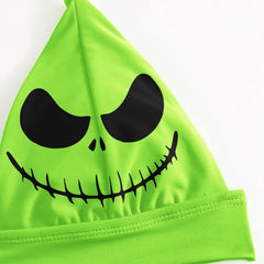 A sexy green two-piece string bikini for women, perfect for making a statement on the beach. The bikini features a halter V-neck, adjustable spaghetti straps, and removable soft padded cups for a flattering fit. Playful quote and Nightmare Before Christmas characters add a unique touch to this swimsuit. Stand out and have fun in this one-of-a-kind bathing suit.