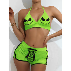 A sexy green two-piece string bikini for women, perfect for making a statement on the beach. The bikini features a halter V-neck, adjustable spaghetti straps, and removable soft padded cups for a flattering fit. Playful quote and Nightmare Before Christmas characters add a unique touch to this swimsuit. Stand out and have fun in this one-of-a-kind bathing suit.