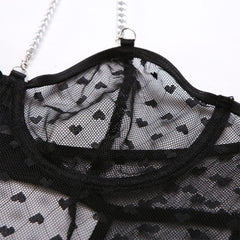 Wonder Skull Women's Lingerie Set featuring a Black Lace Teddy Bodysuit with an Attractive Neck Chain. Flattering for every body type, with adjustable chain and stretchable lace for a custom fit. Versatile and easy to style, with a convenient snap closure. Elegant design with a unique twist, empowering and boosting confidence with every wear.