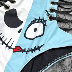 Wonder Skull playful blue and white Push Up One Piece Swimsuit, Tummy Control Cut-Out Bodysuit features a unique skull print with cartoon eyes, lace-up side cutouts, and adjustable straps for a fun and flattering fit. Designed with a push-up effect, tummy control, and UPF 50+ protection, it offers comfort, support, and versatility for all your beach or pool adventures.