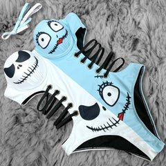 Wonder Skull playful blue and white Push Up One Piece Swimsuit, Tummy Control Cut-Out Bodysuit features a unique skull print with cartoon eyes, lace-up side cutouts, and adjustable straps for a fun and flattering fit. Designed with a push-up effect, tummy control, and UPF 50+ protection, it offers comfort, support, and versatility for all your beach or pool adventures.