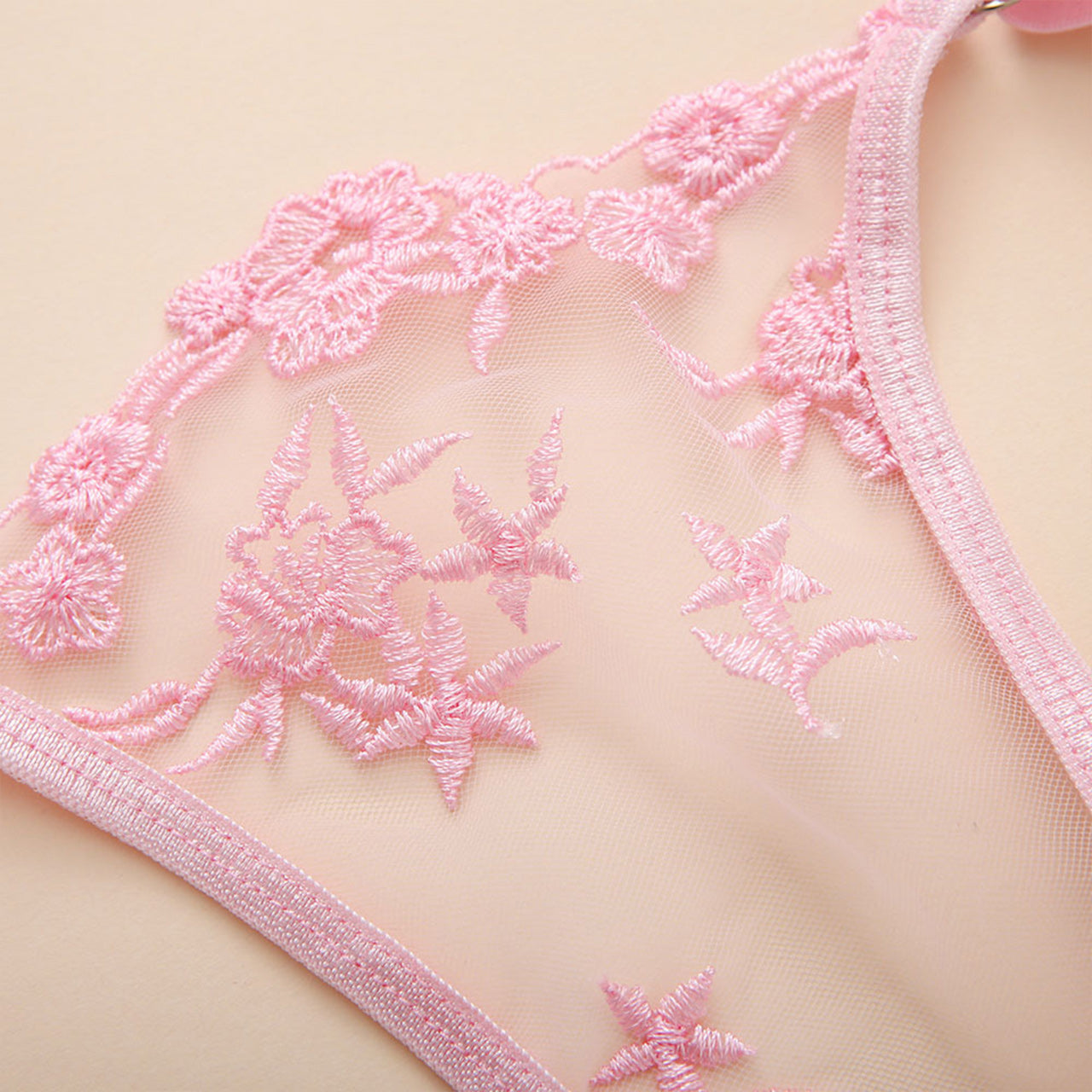 Ignite passion with our Women's Sexy Lingerie Set featuring a cute lace design, garter belt, and matching thongs. The 4-piece ensemble, including fishnet mesh, satin rave outfits, and velvet sleepwear sets, offers options to suit your mood. Enjoy a perfect fit with adjustable straps and closures for personalized comfort. Ideal for romantic nights, honeymoons, birthdays, or as a thoughtful gift for special occasions.