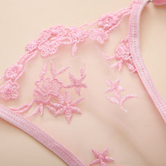 Ignite passion with our Women's Sexy Lingerie Set featuring a cute lace design, garter belt, and matching thongs. The 4-piece ensemble, including fishnet mesh, satin rave outfits, and velvet sleepwear sets, offers options to suit your mood. Enjoy a perfect fit with adjustable straps and closures for personalized comfort. Ideal for romantic nights, honeymoons, birthdays, or as a thoughtful gift for special occasions.