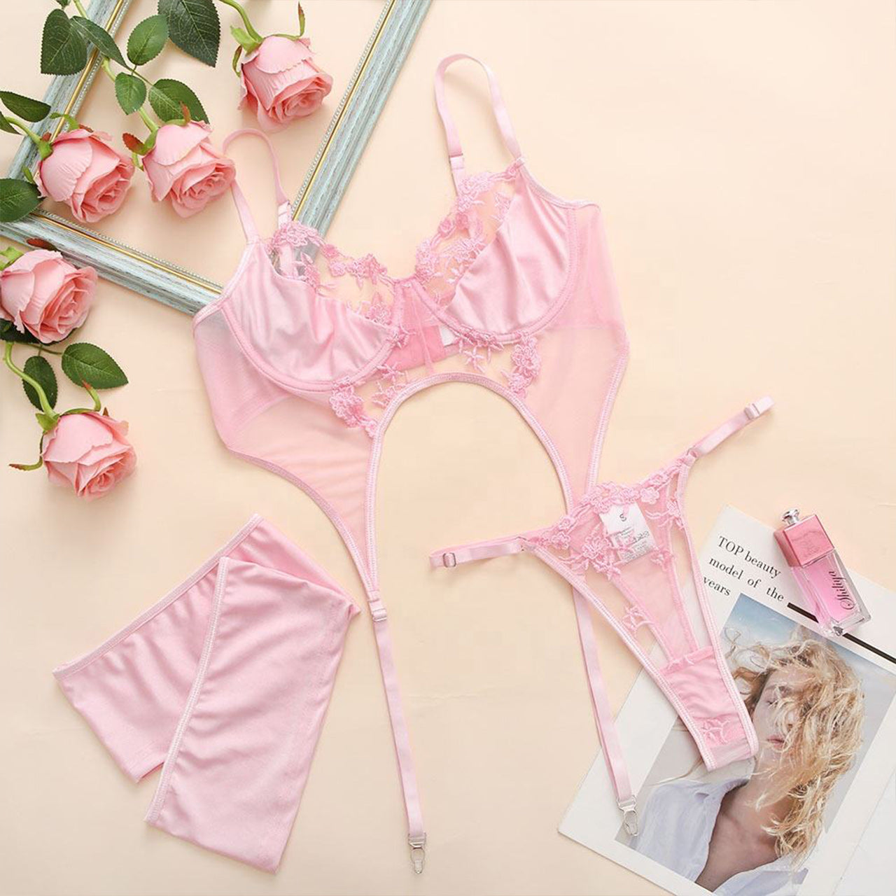 Ignite passion with our Women's Sexy Lingerie Set featuring a cute lace design, garter belt, and matching thongs. The 4-piece ensemble, including fishnet mesh, satin rave outfits, and velvet sleepwear sets, offers options to suit your mood. Enjoy a perfect fit with adjustable straps and closures for personalized comfort. Ideal for romantic nights, honeymoons, birthdays, or as a thoughtful gift for special occasions.