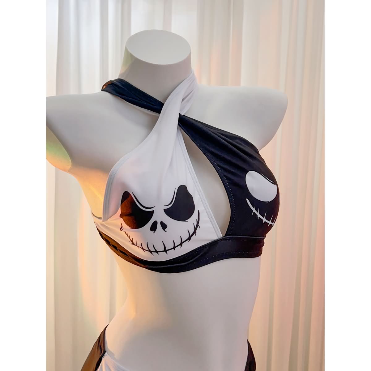 Wonder Skull Bikini 2 Piece Set High Waist Cross Strap Swimsuit combines comfort and style with its soft, stretchy fabric and flattering high-waisted design. Featuring unique cross-strap accents and adjustable straps for a perfect fit, it’s made for all body types and ideal for enjoying shared moments by the water or outdoors.