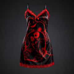 Experience better sleep with the Wonder Skull Chemise Nightgown. Its buttery-soft satin feels amazing, while red lace panels at the neckline, sides, and hem keep you cool all night. The adjustable straps and flowing A-line silhouette allow for a comfortable, non-restrictive fit. Bold red crackle skeleton artwork is balanced by sweet satin bows, adding a feminine touch.