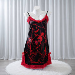 Experience better sleep with the Wonder Skull Chemise Nightgown. Its buttery-soft satin feels amazing, while red lace panels at the neckline, sides, and hem keep you cool all night. The adjustable straps and flowing A-line silhouette allow for a comfortable, non-restrictive fit. Bold red crackle skeleton artwork is balanced by sweet satin bows, adding a feminine touch.