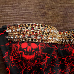 Wonder Skull Cut Out Bikini Red Skull One Pice Swimsuit features a striking red skull and rose design with lightning details, accented by subtle gold crystals for added style. Its tummy control fit and adjustable straps offer comfort and confidence, while the high-quality stretch fabric ensures durability and flexibility. Perfect for days by the water or relaxing with loved ones, this swimsuit combines individuality, comfort, and support.