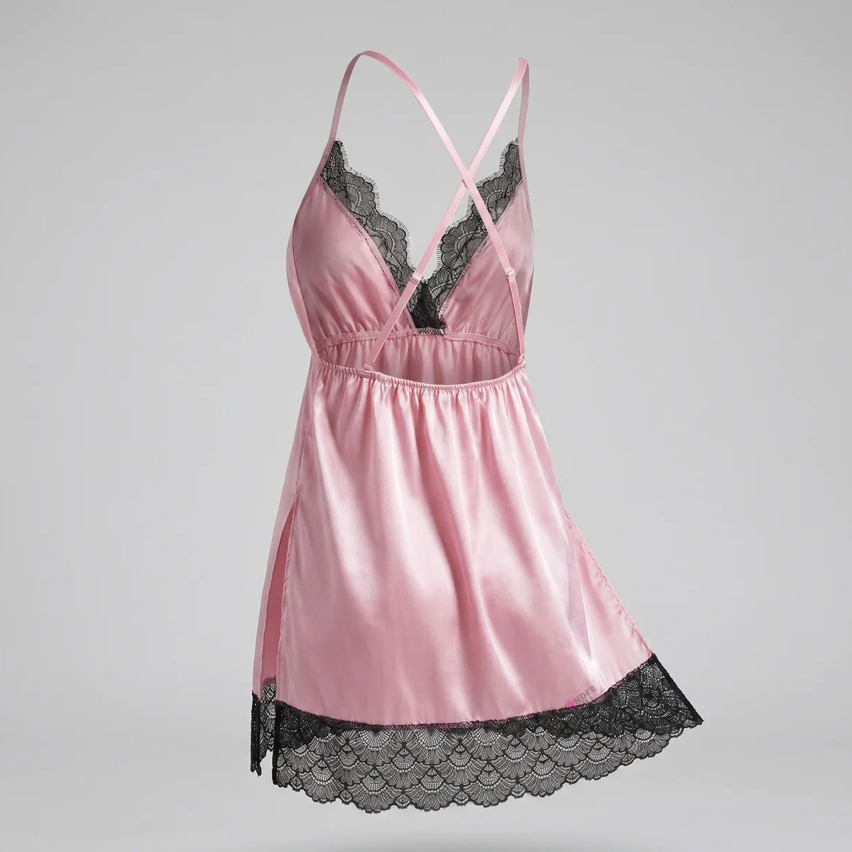 Make your nighttime routine beautiful with the Wonder Skull Pink Black Lace Chemise. Its buttery-smooth satin glides against your skin, and the elastic cinched waist flatters your shape. Adjustable criss-cross back straps stay in place and customize the fit. Delicate, soft scalloped eyelash lace adds a romantic contrast at the neckline and hem. Plus, side slits allow for easy movement, so you can wake up comfortable and tangle-free.
