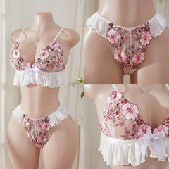 Wonder Skull Pink Floral Lace Embroidered Ruffle Bralette and Panty Set offers a feminine look without uncomfortable squeezing or digging. Its wire-free, soft cup design and breathable mesh fabric allow for natural movement while keeping you cool. The smooth floral embroidery adds a touch of romance without causing irritation. Adjustable straps and a hook-and-eye closure ensure a custom, secure fit. Finished with sweet white ruffle trim and satin bows, this set is designed to make you feel both beautiful an