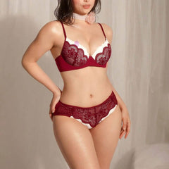 Wonder Skull Red Lace Lingerie Set provides confident support with playful details. Padded underwire cups lift and shape without digging, and the soft floral lace feels gentle on your skin. White lace ruffles add a romantic contrast. The high-waisted panty smooths and flatters, featuring full lace coverage in front and a cheeky, skull-accented graphic print on the back. Adjustable straps and a secure hook closure ensure a comfortable, customized fit.