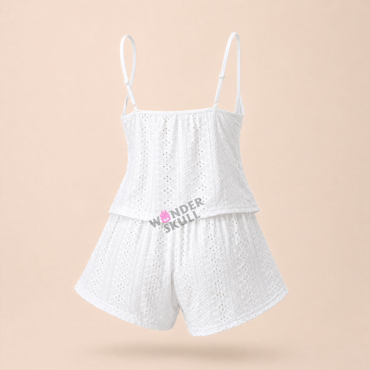 Stay cool and comfortable all night with the Wonder Skull Pajama Set. The breathable, embroidered fabric allows for constant airflow to prevent overheating, while the soft, scalloped lace trim adds a romantic detail without irritation. Customize your fit with the adjustable tie-front closure and a comfortable elastic waistband. The lightweight fabric helps you sleep peacefully and wake up refreshed.