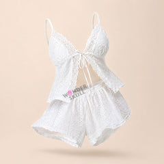 Stay cool and comfortable all night with the Wonder Skull Pajama Set. The breathable, embroidered fabric allows for constant airflow to prevent overheating, while the soft, scalloped lace trim adds a romantic detail without irritation. Customize your fit with the adjustable tie-front closure and a comfortable elastic waistband. The lightweight fabric helps you sleep peacefully and wake up refreshed.