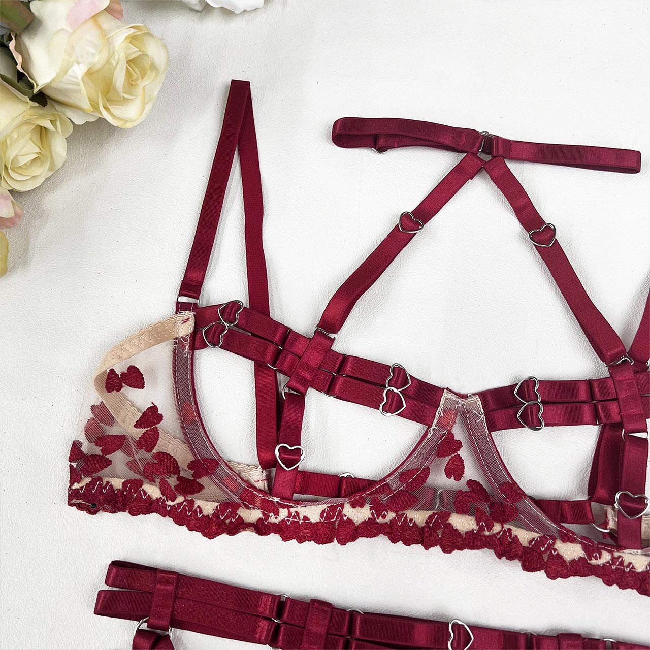 Women's Lingerie Set with Sensual Open Garter Belt, Bra, and Panty from Wonder Skull Store. Meticulously crafted to bring an air of intrigue and romance into your intimate moments. Designed to accentuate feminine curves for an irresistibly attractive look. Made from lightweight, breathable materials for extended comfort. Easy-to-wear and remove garter straps for practicality and sexiness. Versatile ensemble to mix and match for numerous stylistic expressions.