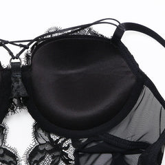 Welcome to the world of allure and elegance with the Nightmare Bandage Women's Bodysuit Sexy Hollow Lace Push Up.