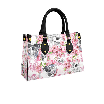 Wonder Skull structured tote bag solves the "I can't find anything in my bag" problem. The roomy interior fits your tablet, phone, wallet, water bottle, umbrella, and cosmetics — without the overstuffed look. Multiple interior pockets keep everything organized, so you're never digging around at checkout. Reinforced rivet corners and quality metal hardware ensure the bag holds up to daily use. Whether you're heading to work, running errands, or catching a flight, this tote keeps you looking put-together.
