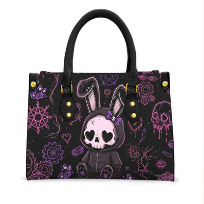 Wonder Skull structured tote bag solves the "I can't find anything in my bag" problem. The roomy interior fits your tablet, phone, wallet, water bottle, umbrella, and cosmetics — without the overstuffed look. Multiple interior pockets keep everything organized, so you're never digging around at checkout. Reinforced rivet corners and quality metal hardware ensure the bag holds up to daily use. Whether you're heading to work, running errands, or catching a flight, this tote keeps you looking put-together.