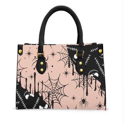 Wonder Skull structured tote bag solves the "I can't find anything in my bag" problem. The roomy interior fits your tablet, phone, wallet, water bottle, umbrella, and cosmetics — without the overstuffed look. Multiple interior pockets keep everything organized, so you're never digging around at checkout. Reinforced rivet corners and quality metal hardware ensure the bag holds up to daily use. Whether you're heading to work, running errands, or catching a flight, this tote keeps you looking put-together.