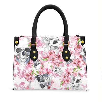 Wonder Skull structured tote bag solves the "I can't find anything in my bag" problem. The roomy interior fits your tablet, phone, wallet, water bottle, umbrella, and cosmetics — without the overstuffed look. Multiple interior pockets keep everything organized, so you're never digging around at checkout. Reinforced rivet corners and quality metal hardware ensure the bag holds up to daily use. Whether you're heading to work, running errands, or catching a flight, this tote keeps you looking put-together.