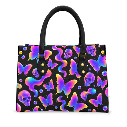 Wonder Skull structured tote bag solves the "I can't find anything in my bag" problem. The aoomy interior fits your tablet, phone, wallet, water bottle, umbrella, and cosmetics — without the overstuffed look. Multiple interior pockets keep everything organized, so you're never digging around at checkout. Reinforced rivet corners and quality metal hardware ensure the bag holds up to daily use. Whether you're heading to work, running errands, or catching a flight, this tote keeps you looking put-together.