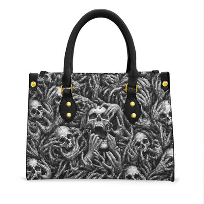 Wonder Skull structured tote bag solves the "I can't find anything in my bag" problem. The aoomy interior fits your tablet, phone, wallet, water bottle, umbrella, and cosmetics — without the overstuffed look. Multiple interior pockets keep everything organized, so you're never digging around at checkout. Reinforced rivet corners and quality metal hardware ensure the bag holds up to daily use. Whether you're heading to work, running errands, or catching a flight, this tote keeps you looking put-together.