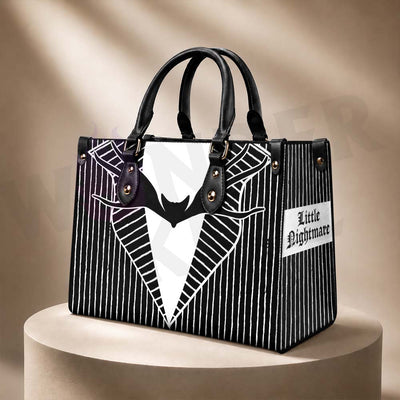 Wonder Skull structured tote bag solves the "I can't find anything in my bag" problem. The roomy interior fits your tablet, phone, wallet, water bottle, umbrella, and cosmetics — without the overstuffed look. Multiple interior pockets keep everything organized, so you're never digging around at checkout. Reinforced rivet corners and quality metal hardware ensure the bag holds up to daily use. Whether you're heading to work, running errands, or catching a flight, this tote keeps you looking put-together.