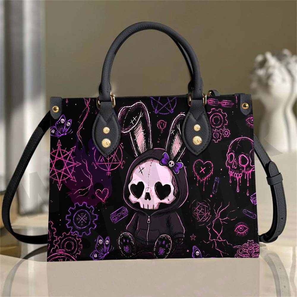 Wonder Skull structured tote bag solves the "I can't find anything in my bag" problem. The roomy interior fits your tablet, phone, wallet, water bottle, umbrella, and cosmetics — without the overstuffed look. Multiple interior pockets keep everything organized, so you're never digging around at checkout. Reinforced rivet corners and quality metal hardware ensure the bag holds up to daily use. Whether you're heading to work, running errands, or catching a flight, this tote keeps you looking put-together.