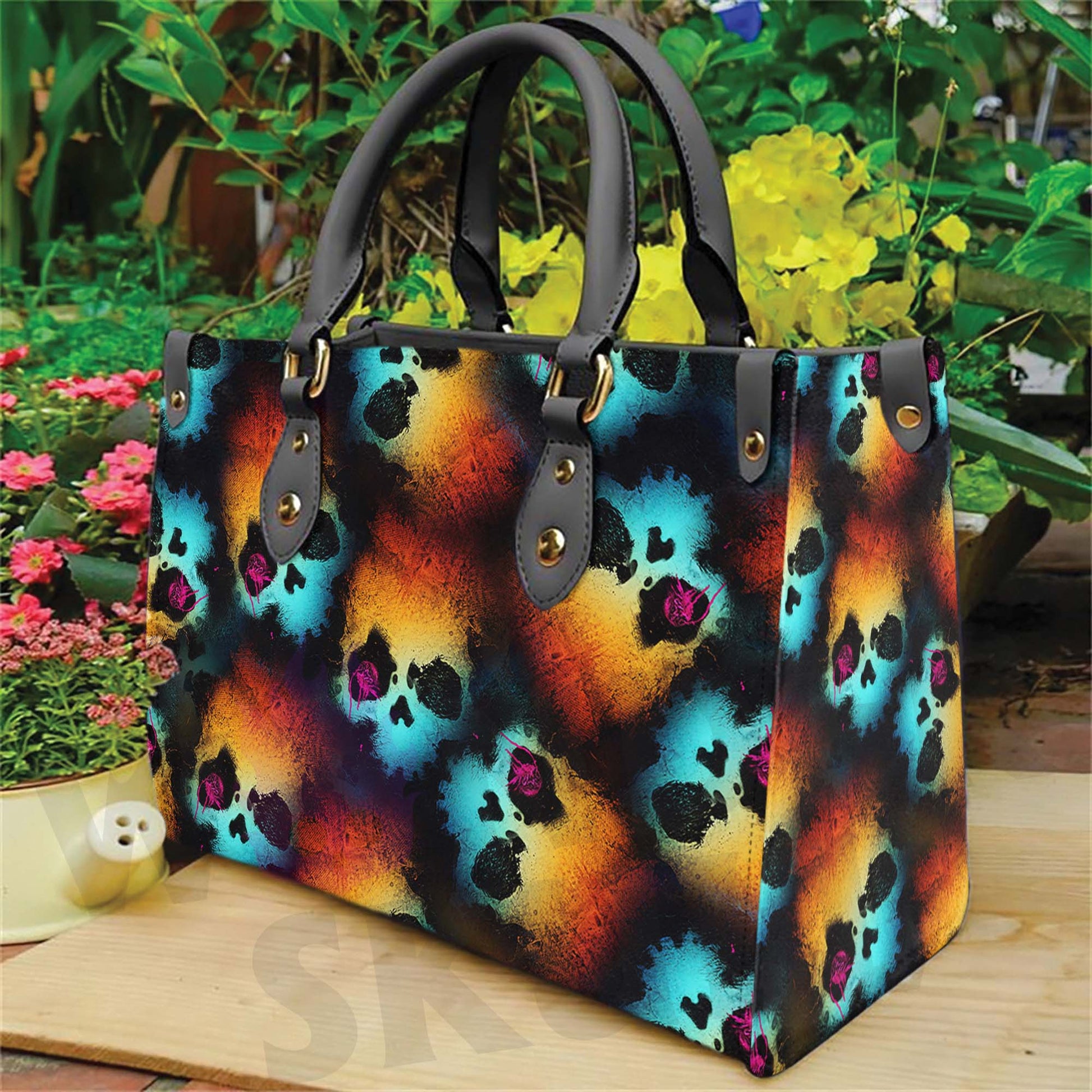 Wonder Skull structured tote bag solves the "I can't find anything in my bag" problem. The roomy interior fits your tablet, phone, wallet, water bottle, umbrella, and cosmetics — without the overstuffed look. Multiple interior pockets keep everything organized, so you're never digging around at checkout. Reinforced rivet corners and quality metal hardware ensure the bag holds up to daily use. Whether you're heading to work, running errands, or catching a flight, this tote keeps you looking put-together.