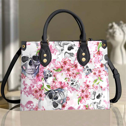 Wonder Skull structured tote bag solves the "I can't find anything in my bag" problem. The roomy interior fits your tablet, phone, wallet, water bottle, umbrella, and cosmetics — without the overstuffed look. Multiple interior pockets keep everything organized, so you're never digging around at checkout. Reinforced rivet corners and quality metal hardware ensure the bag holds up to daily use. Whether you're heading to work, running errands, or catching a flight, this tote keeps you looking put-together.