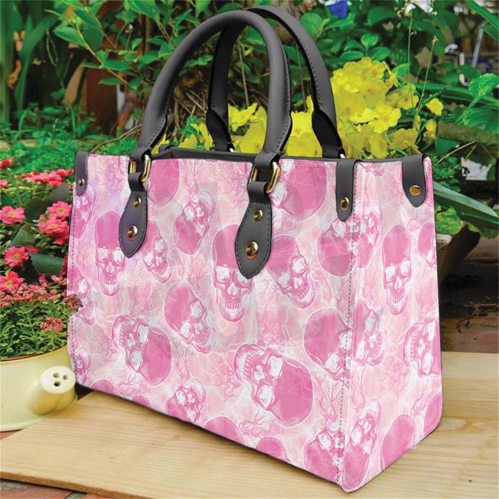 Wonder Skull structured tote bag solves the "I can't find anything in my bag" problem. The roomy interior fits your tablet, phone, wallet, water bottle, umbrella, and cosmetics — without the overstuffed look. Multiple interior pockets keep everything organized, so you're never digging around at checkout. Reinforced rivet corners and quality metal hardware ensure the bag holds up to daily use. Whether you're heading to work, running errands, or catching a flight, this tote keeps you looking put-together.