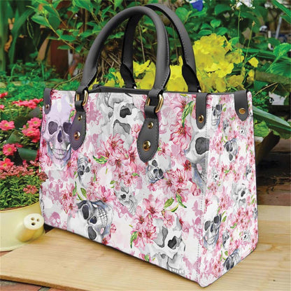 Wonder Skull structured tote bag solves the "I can't find anything in my bag" problem. The roomy interior fits your tablet, phone, wallet, water bottle, umbrella, and cosmetics — without the overstuffed look. Multiple interior pockets keep everything organized, so you're never digging around at checkout. Reinforced rivet corners and quality metal hardware ensure the bag holds up to daily use. Whether you're heading to work, running errands, or catching a flight, this tote keeps you looking put-together.