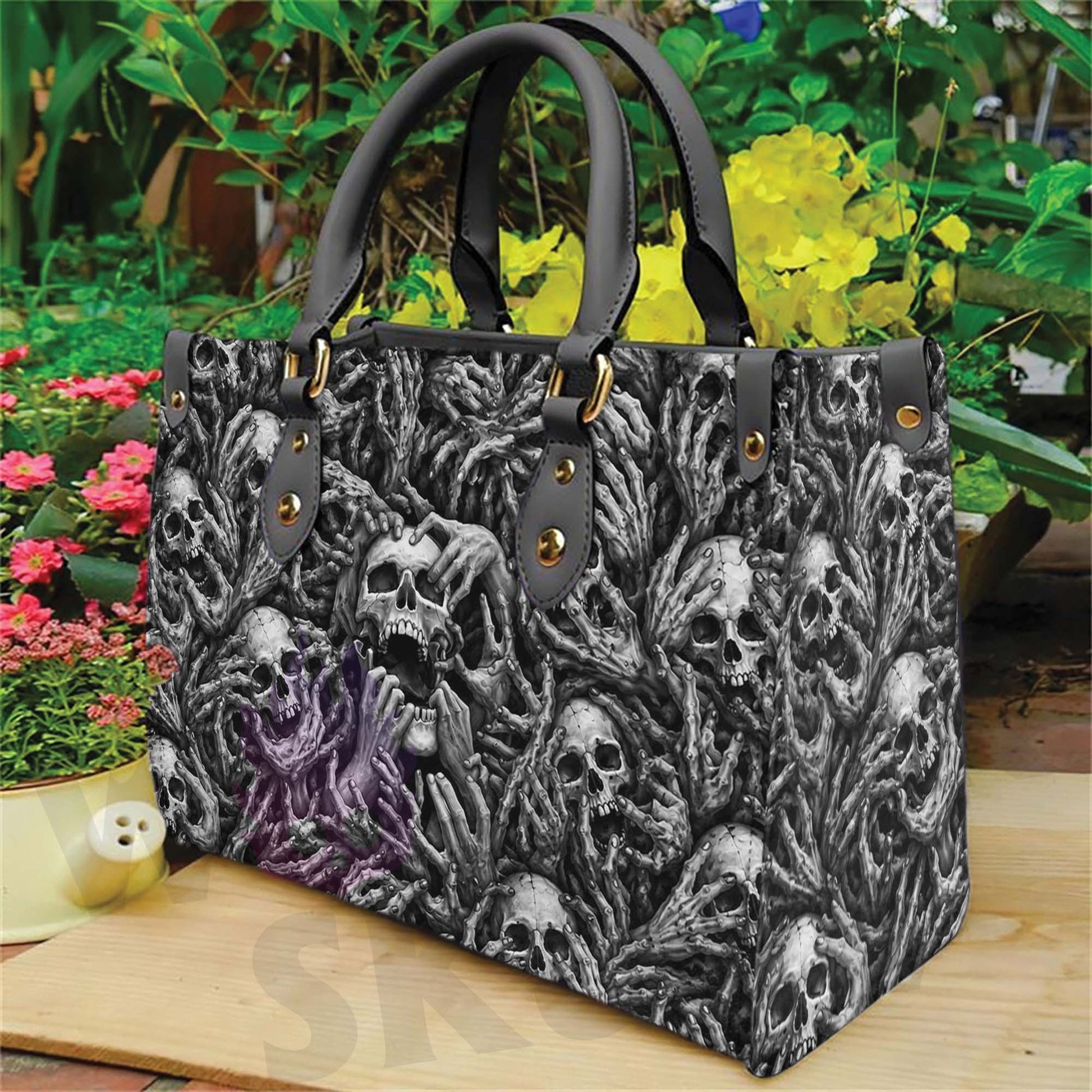 Wonder Skull structured tote bag solves the "I can't find anything in my bag" problem. The aoomy interior fits your tablet, phone, wallet, water bottle, umbrella, and cosmetics — without the overstuffed look. Multiple interior pockets keep everything organized, so you're never digging around at checkout. Reinforced rivet corners and quality metal hardware ensure the bag holds up to daily use. Whether you're heading to work, running errands, or catching a flight, this tote keeps you looking put-together.