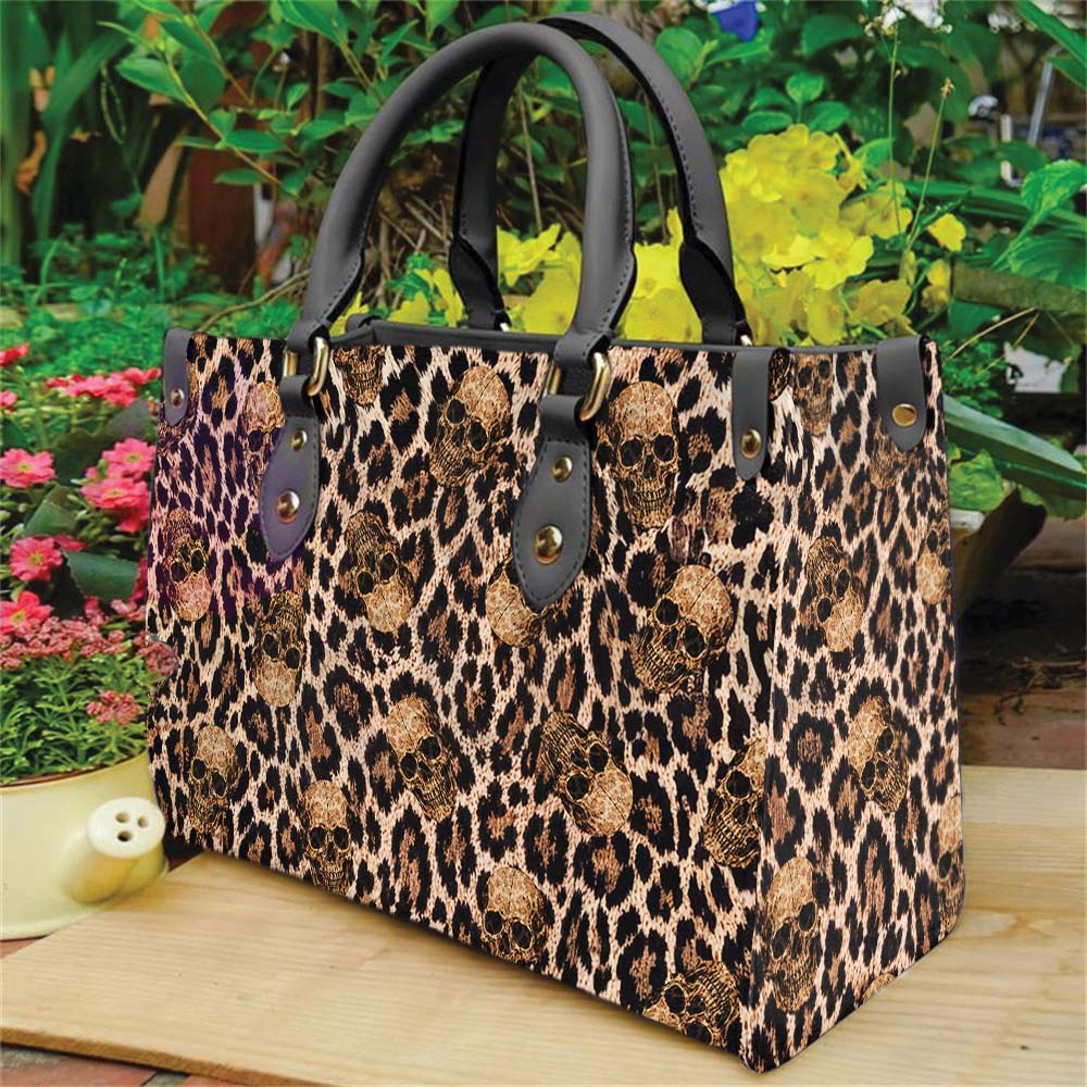 Wonder Skull structured tote bag solves the "I can't find anything in my bag" problem. The roomy interior fits your tablet, phone, wallet, water bottle, umbrella, and cosmetics — without the overstuffed look. Multiple interior pockets keep everything organized, so you're never digging around at checkout. Reinforced rivet corners and quality metal hardware ensure the bag holds up to daily use. Whether you're heading to work, running errands, or catching a flight, this tote keeps you looking put-together.