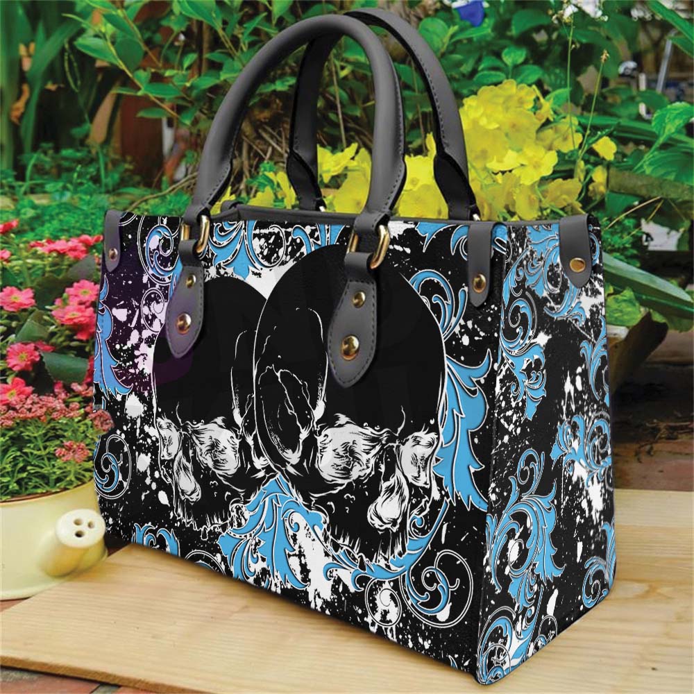 Wonder Skull structured tote bag solves the "I can't find anything in my bag" problem. The roomy interior fits your tablet, phone, wallet, water bottle, umbrella, and cosmetics — without the overstuffed look. Multiple interior pockets keep everything organized, so you're never digging around at checkout. Reinforced rivet corners and quality metal hardware ensure the bag holds up to daily use. Whether you're heading to work, running errands, or catching a flight, this tote keeps you looking put-together.