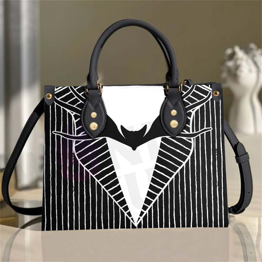 Wonder Skull structured tote bag solves the "I can't find anything in my bag" problem. The roomy interior fits your tablet, phone, wallet, water bottle, umbrella, and cosmetics — without the overstuffed look. Multiple interior pockets keep everything organized, so you're never digging around at checkout. Reinforced rivet corners and quality metal hardware ensure the bag holds up to daily use. Whether you're heading to work, running errands, or catching a flight, this tote keeps you looking put-together.
