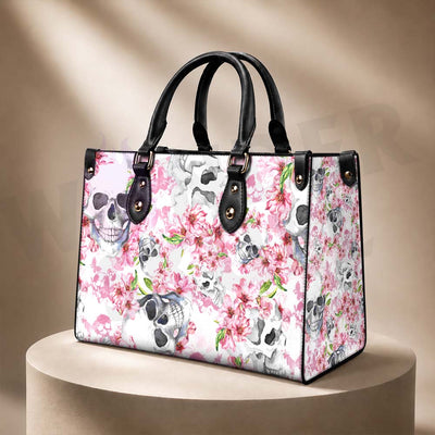 Wonder Skull structured tote bag solves the "I can't find anything in my bag" problem. The roomy interior fits your tablet, phone, wallet, water bottle, umbrella, and cosmetics — without the overstuffed look. Multiple interior pockets keep everything organized, so you're never digging around at checkout. Reinforced rivet corners and quality metal hardware ensure the bag holds up to daily use. Whether you're heading to work, running errands, or catching a flight, this tote keeps you looking put-together.
