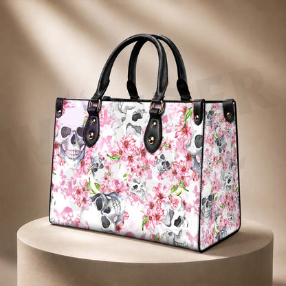 Wonder Skull structured tote bag solves the "I can't find anything in my bag" problem. The roomy interior fits your tablet, phone, wallet, water bottle, umbrella, and cosmetics — without the overstuffed look. Multiple interior pockets keep everything organized, so you're never digging around at checkout. Reinforced rivet corners and quality metal hardware ensure the bag holds up to daily use. Whether you're heading to work, running errands, or catching a flight, this tote keeps you looking put-together.