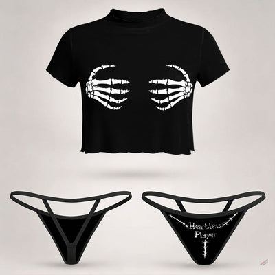 Wonder Skull  sheer mesh crop top and thong set delivers the perfect balance of comfortable and confident. Ultra-lightweight mesh fabric breathes freely against your skin while stretching gently to hug your natural curves without any restrictive squeezing. Playful lettuce edge trim at the neckline, sleeves, and hem adds cute feminine detail with soft ruffled texture. The flattering cropped length hits perfectly above your waist, creating an elongated silhouette that makes you feel amazing. Whether you're we