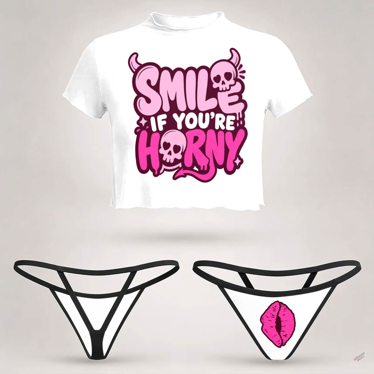 Wonder Skull  sheer mesh crop top and thong set delivers the perfect balance of comfortable and confident. Ultra-lightweight mesh fabric breathes freely against your skin while stretching gently to hug your natural curves without any restrictive squeezing. Playful lettuce edge trim at the neckline, sleeves, and hem adds cute feminine detail with soft ruffled texture. The flattering cropped length hits perfectly above your waist, creating an elongated silhouette that makes you feel amazing. Whether you're we
